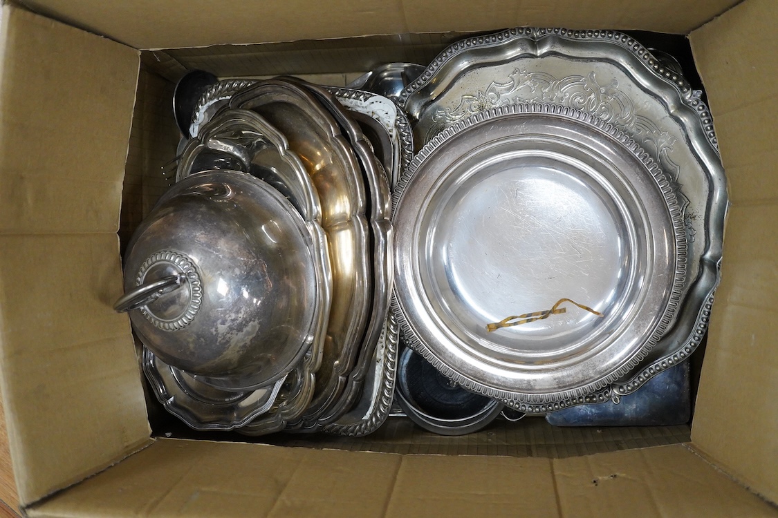 An Old Sheffield plated basket, a plated muffin dish and cover by Elkington & Co and a quantity of assorted plated wares including entrée dishes, flatware, salvers, etc.